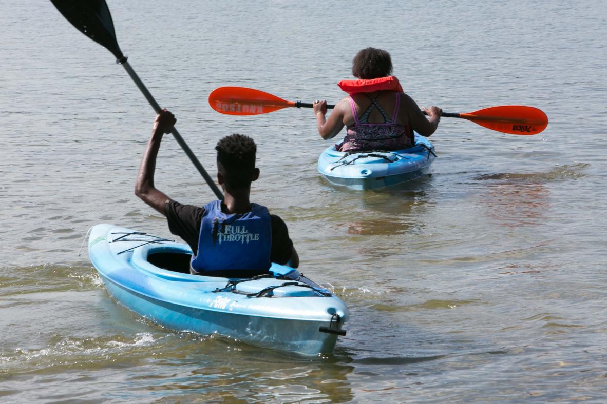 Campers kayaking.