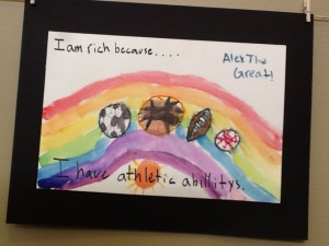 Child's art work framed and hung for exhibit