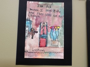 Child's art work framed and hung for exhibit