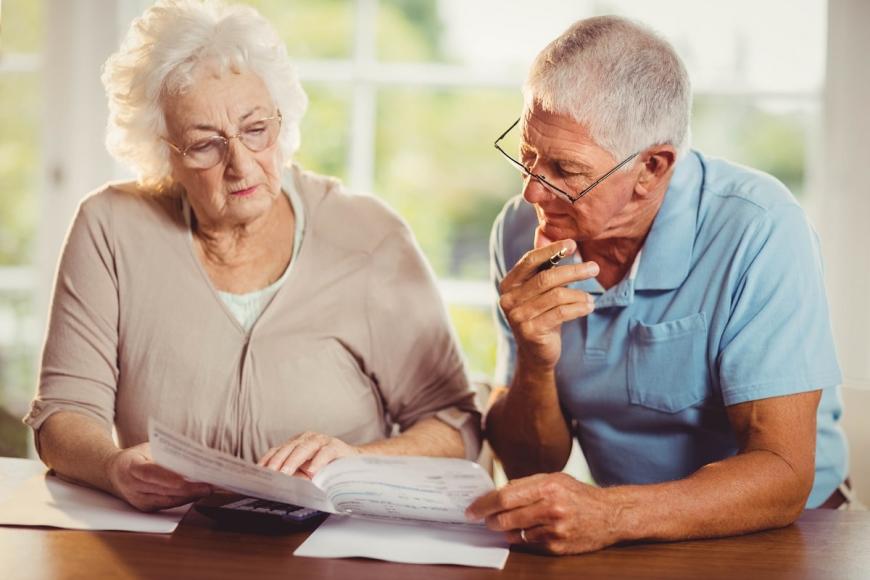 older adults looking at finances