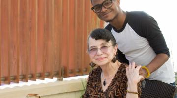 Young African-American man with elderly relative