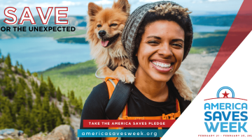 African American individual smiling with dog on their back