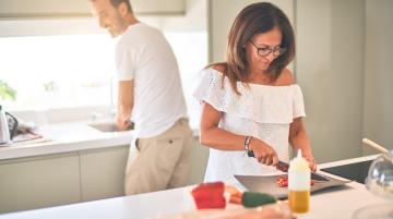 Man and Woman preparing food for meal