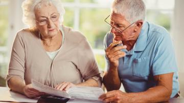 older adults looking at finances
