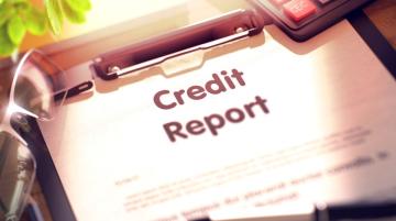credit report on clip board