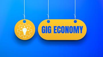 Graphic of light bulb embedded inside a gear.  To the right of the graphic reads, "Gig Economy."