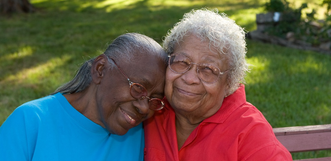 Two women smiling.