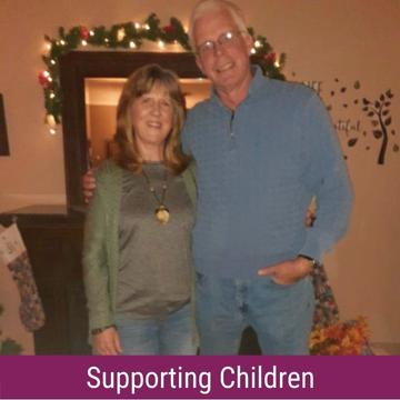 Photo of Jill and Michael Troen with the text "Supporting Children"